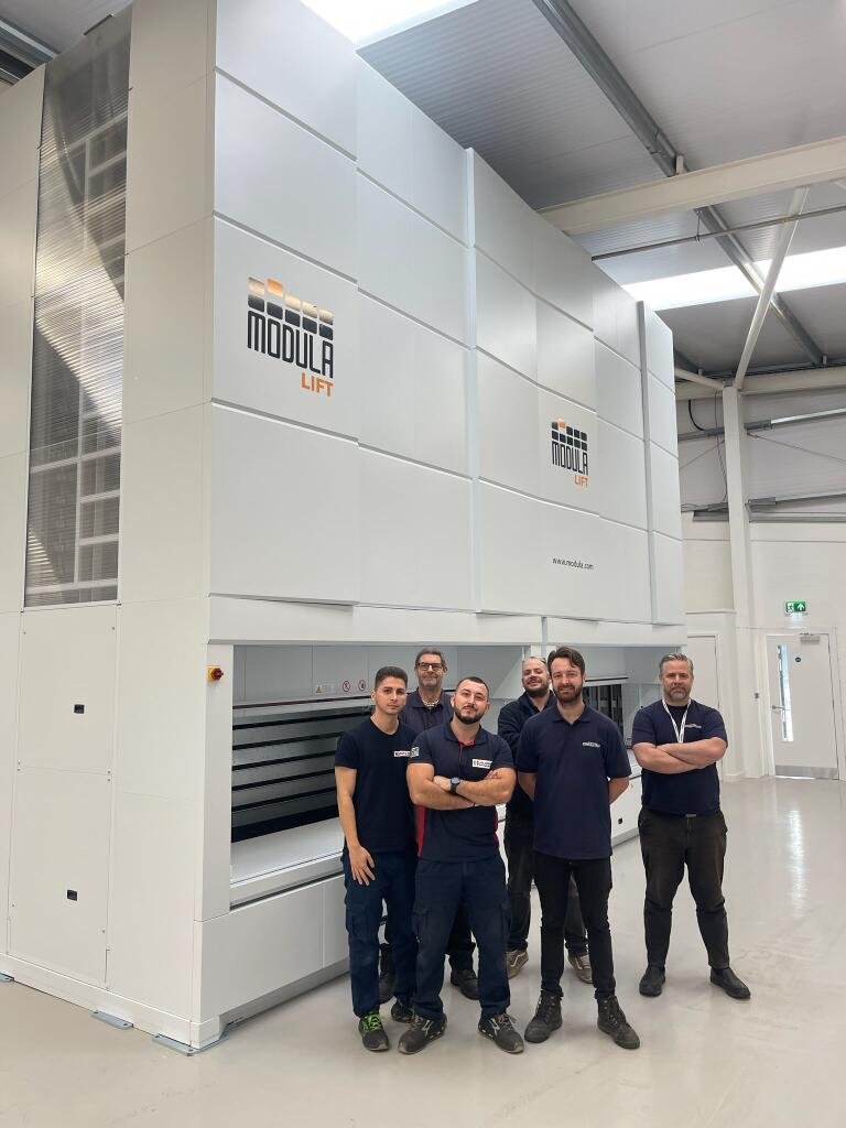 Total connections and the Modula team with the Modula lift storage unit